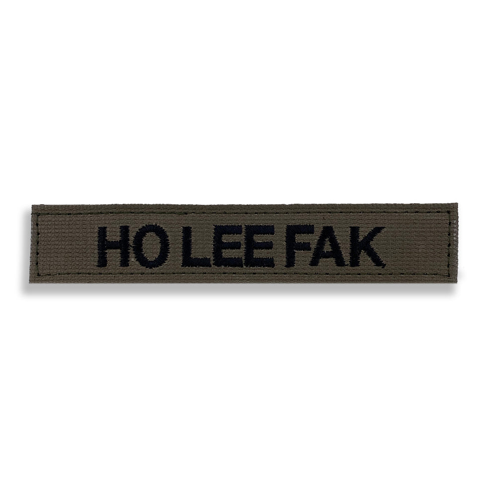 "HO LEE FAK" Namensband